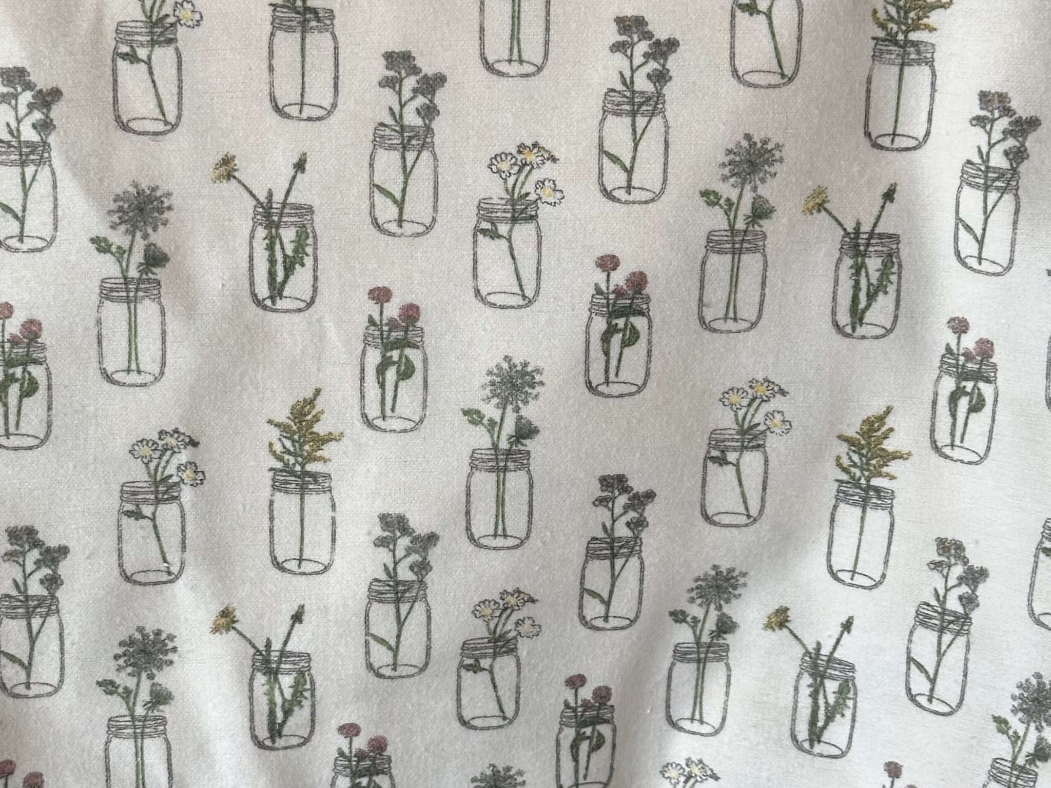 Rice heating pad made with soft cotton flannel with "Save the Bees" printed all over it - cream background
