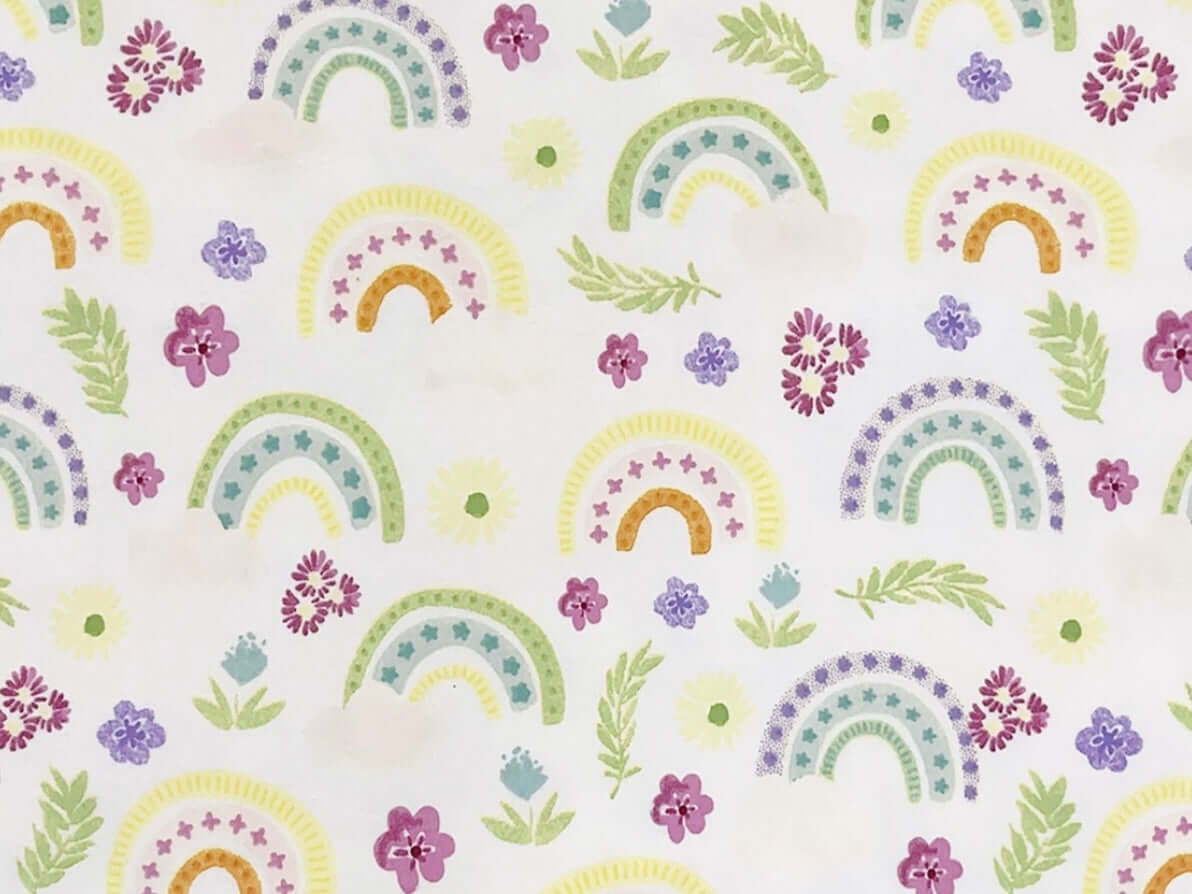 Rice heating pad made with soft cotton flannel with rainbows printed on it