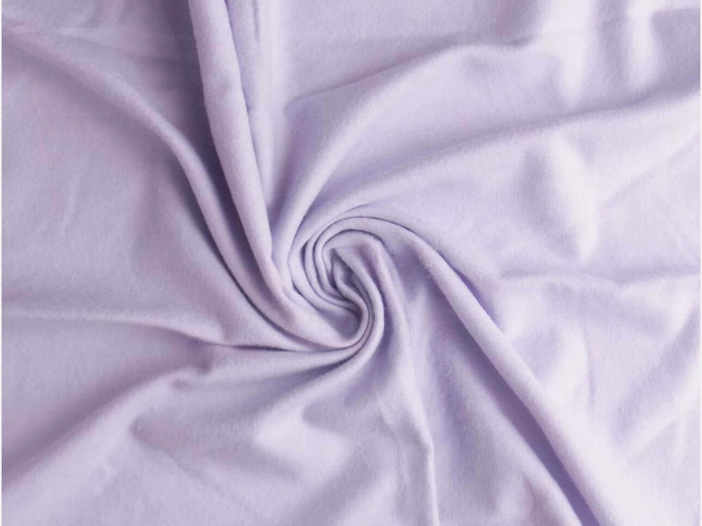 Rice heating pad made with soft cotton flannel in a light purple solid print