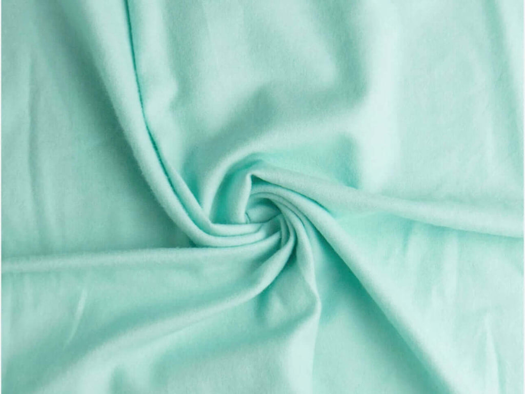 Rice heating pad made with soft cotton flannel in a medium blue solid print