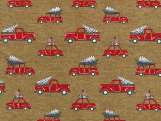 Herbal Comfort Heat Pack - Winter Patterns featuring red trucks with Christmas trees on a brown background.