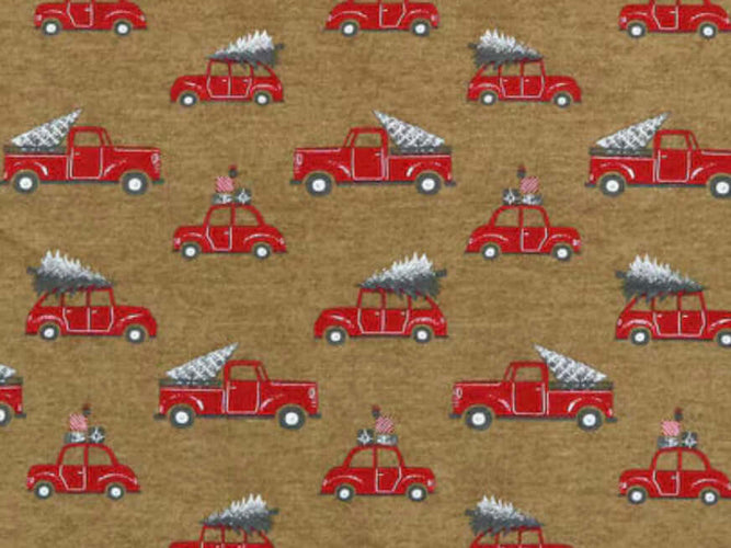 Rice heating pad made with soft cotton flannel with red trucks and Christmas trees printed all over it - kraft brown background