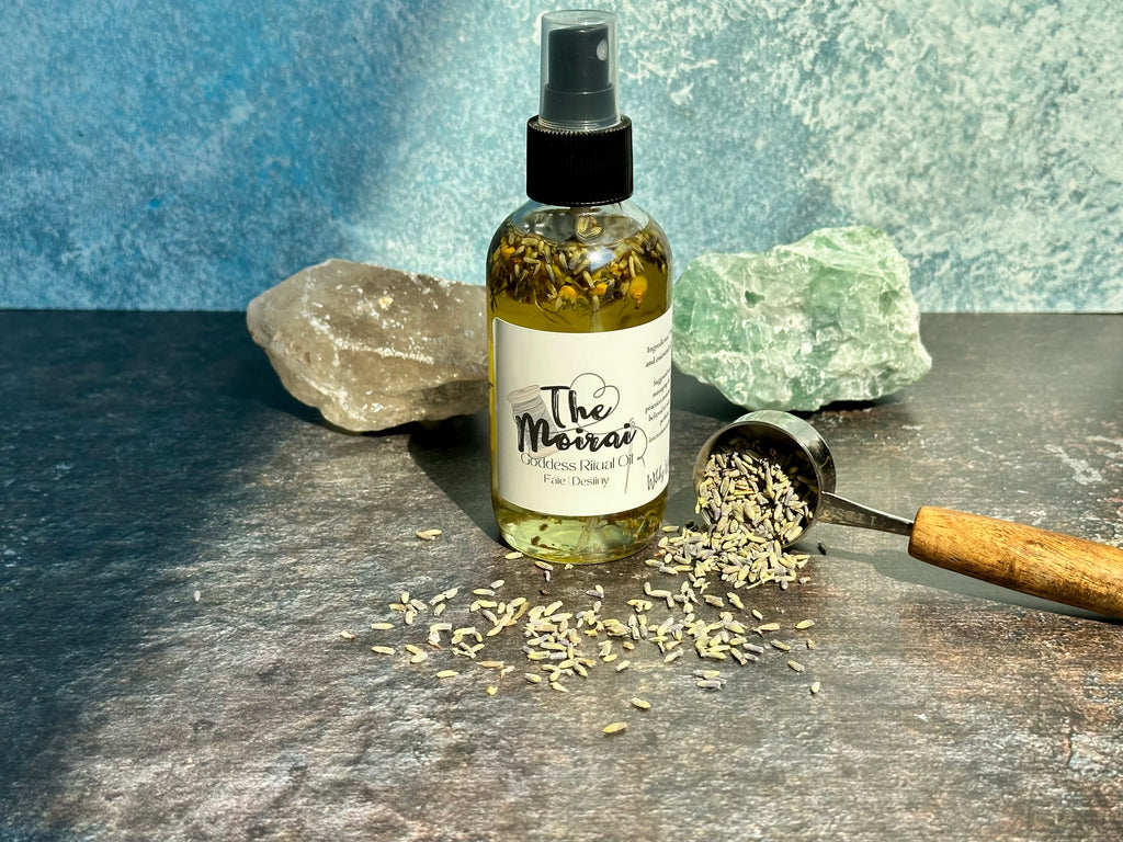 Bottle of 'The Moxa' product with dried herbs on a textured surface
