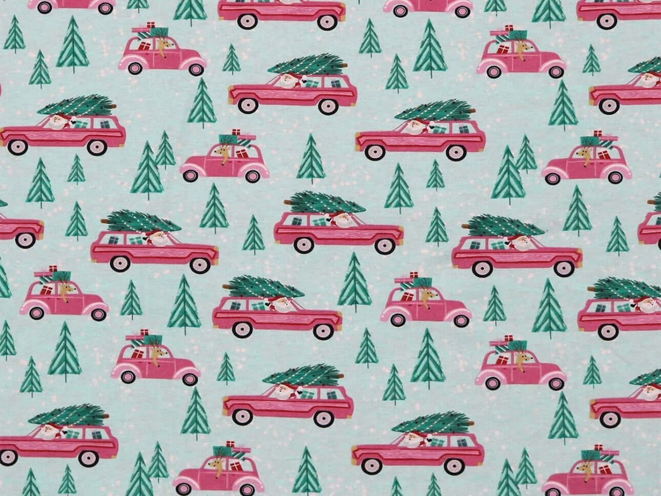 Rice heating pad made with soft cotton flannel with pink station wagons and Christmas trees printed all over it - teal background