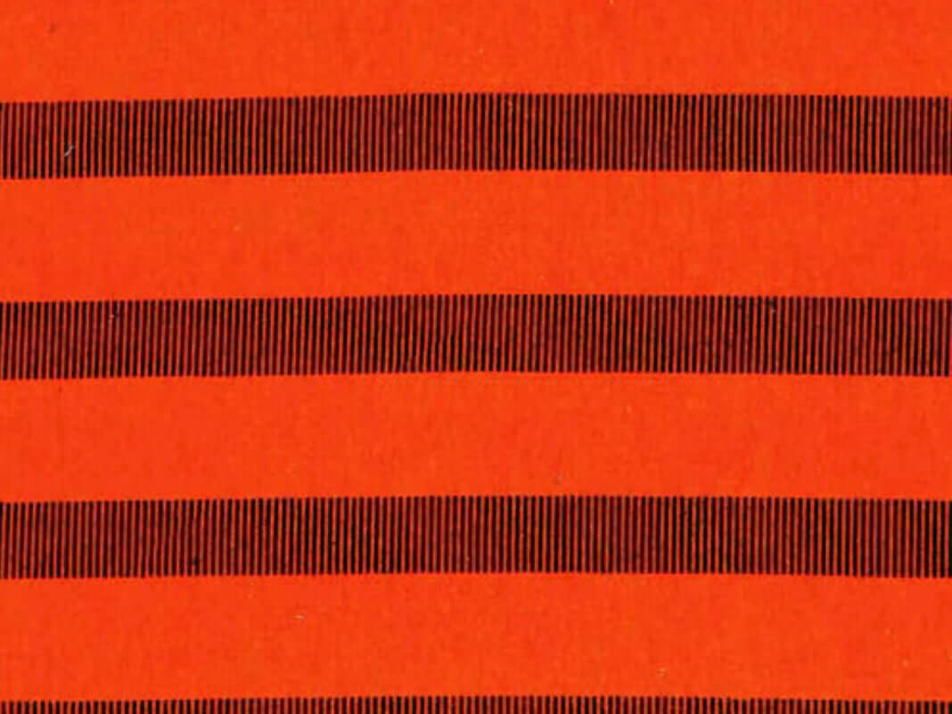 Rice heating pad made with soft cotton flannel with orange and black stripes printed all over it