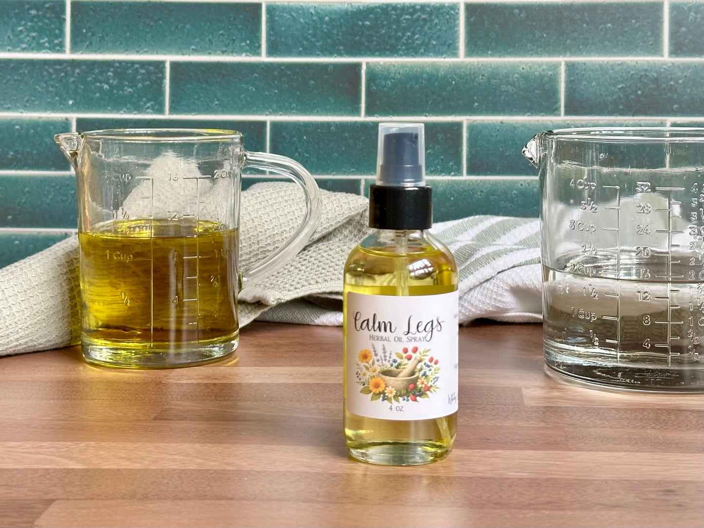 Bottle of 'Calm Legs' with two measuring cups on a wooden surface against a tiled wall.