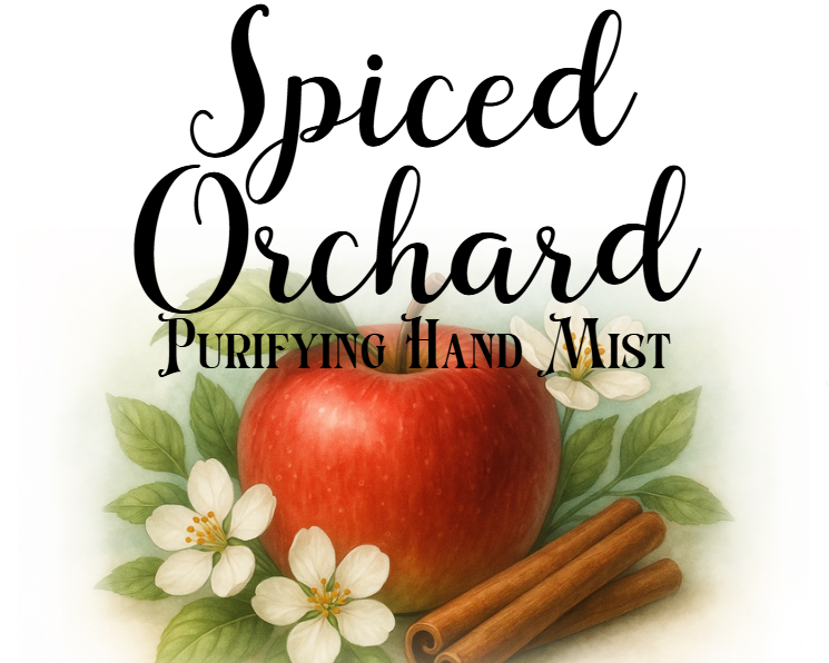Spiced Orchard Purifying Hand Mist with an apple, cinnamon sticks, and flowers on a white background