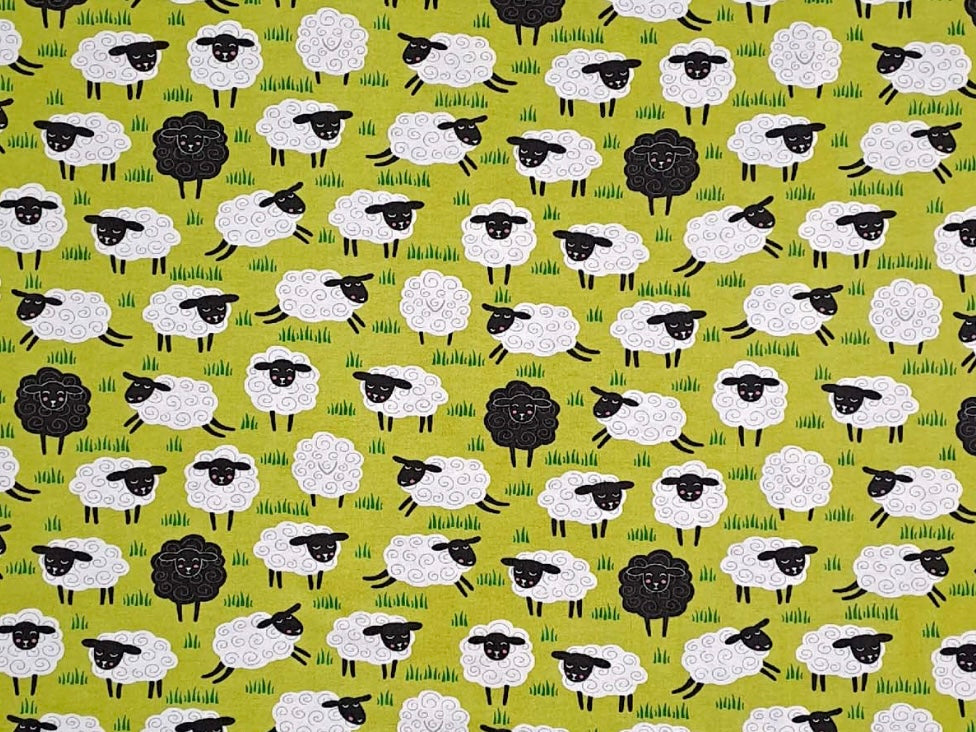 Herbal Comfort Heat Pack - Spring Patterns design featuring playful sheep on a green grass background.