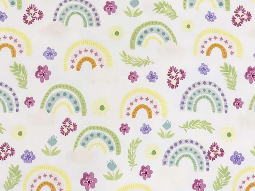 Rice heating pad made with soft cotton flannel with rainbows printed on it
