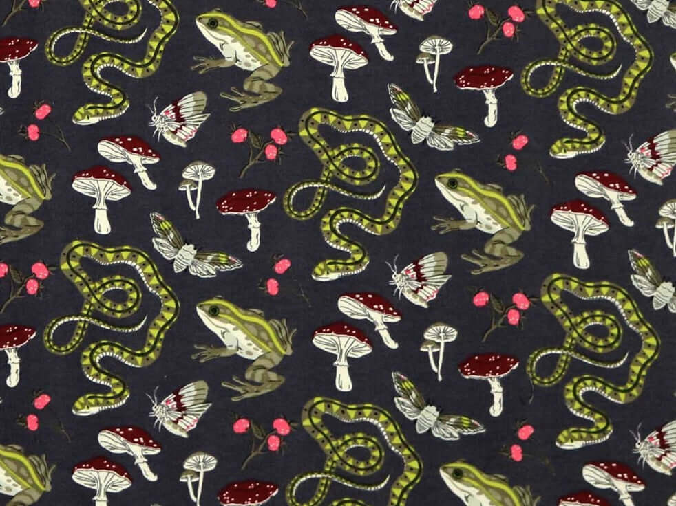 Rice heating pad made with soft cotton flannel with snakes, toads, mushrooms printed all over it- gray background