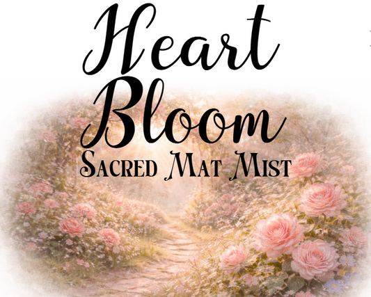 Product packaging with 'Heart Bloom Sacred Mat Mist' text and floral design.