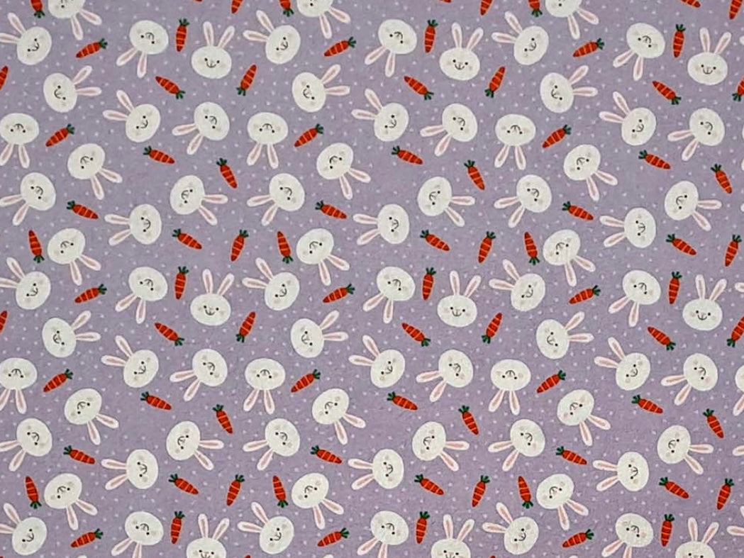 Herbal Comfort Heat Pack - Spring Patterns fabric featuring cute bunnies and carrots on a purple background.