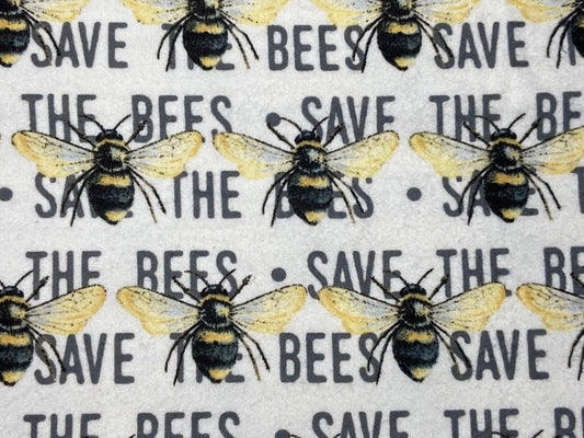 Herbal Comfort Heat Pack - Spring Patterns fabric featuring bees and the phrase 'SAVE THE BEES' in a vibrant design.